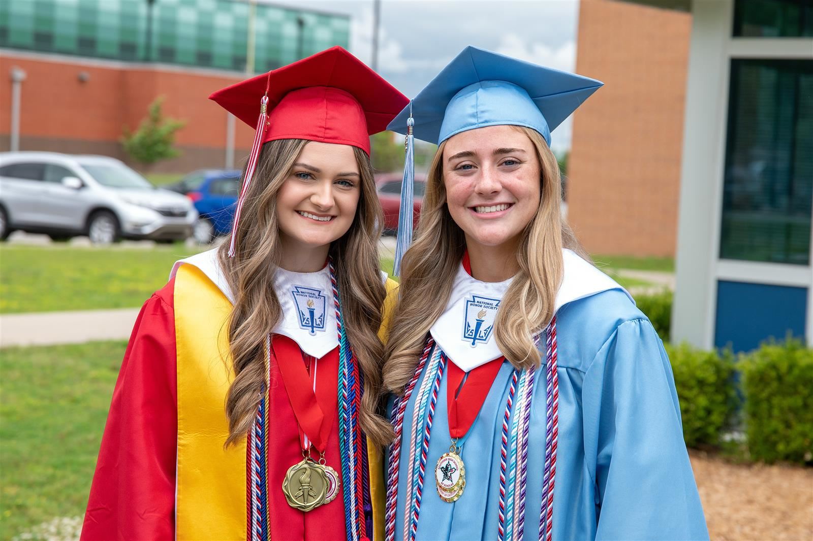 female northside and southside grads smiling for pic